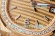 PPM Swiss Clone Patek Philippe Nautilus 7010 Rose Gold Quartz Watch with Diamond Bezel (4)_th.jpg